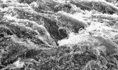 Turbulent water current in black and white